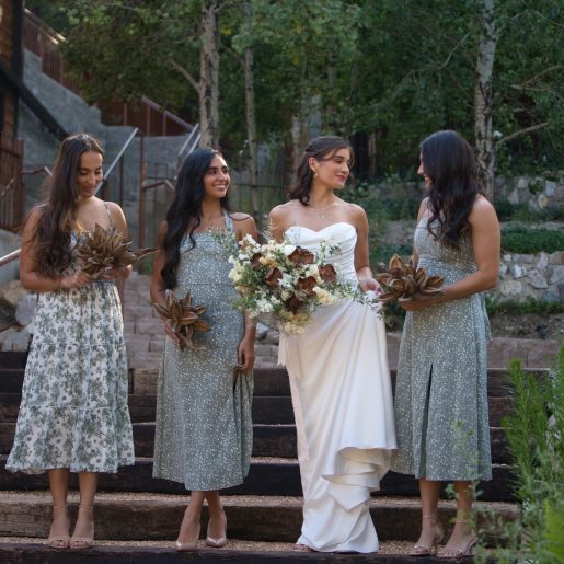 Bride and bride's maids on stairs